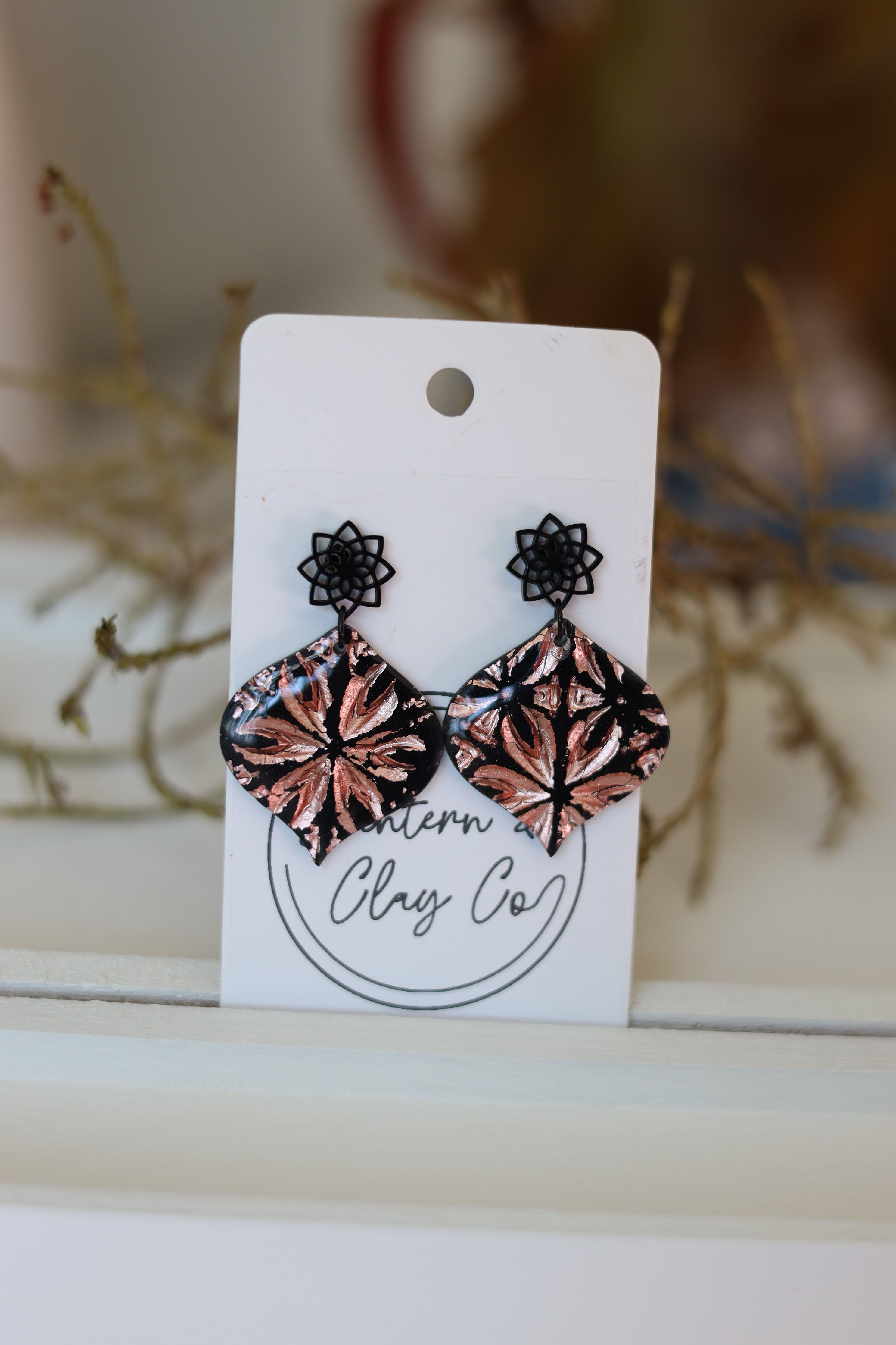 Black and rose gold dangle earrings