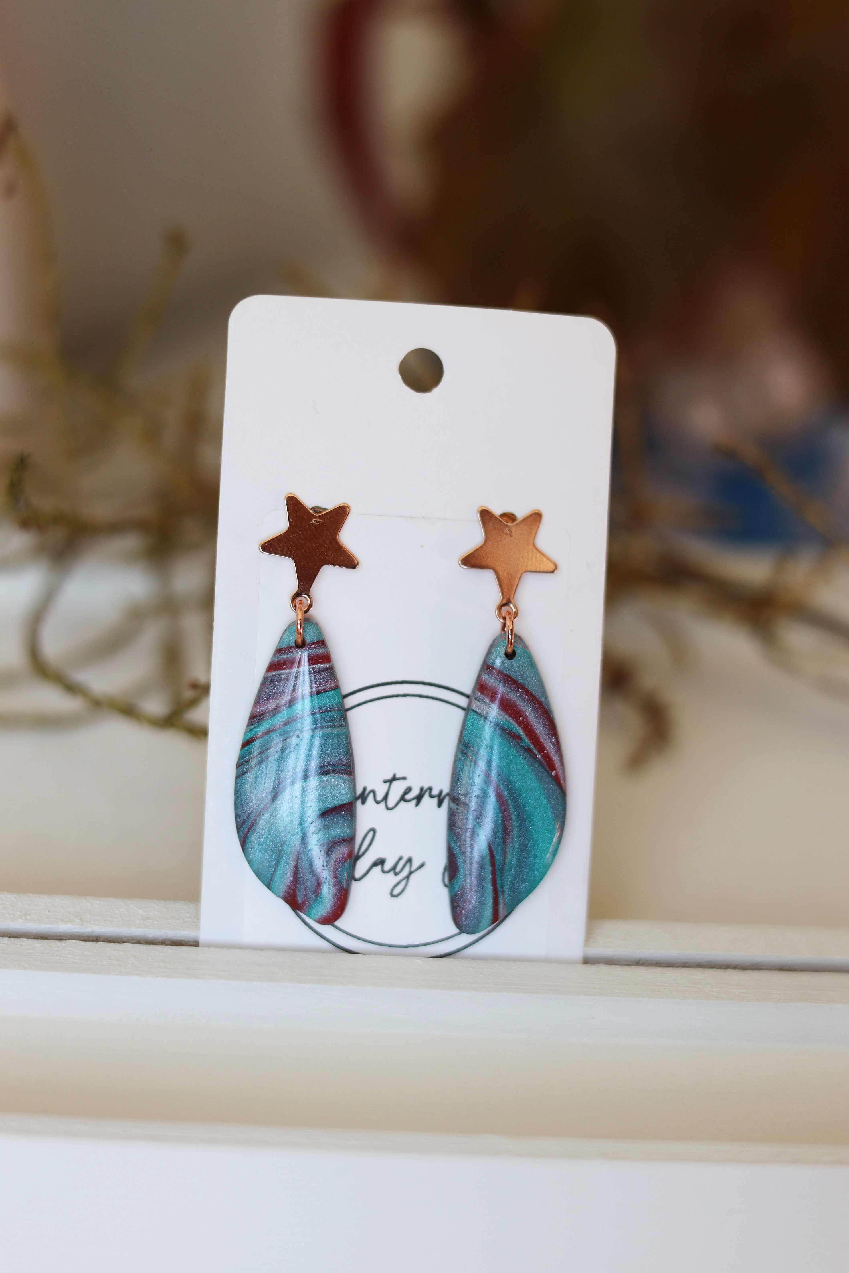 Blue and magenta dangle earrings