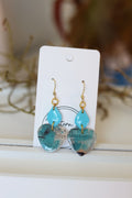 Blue heart shaped dangle earrings