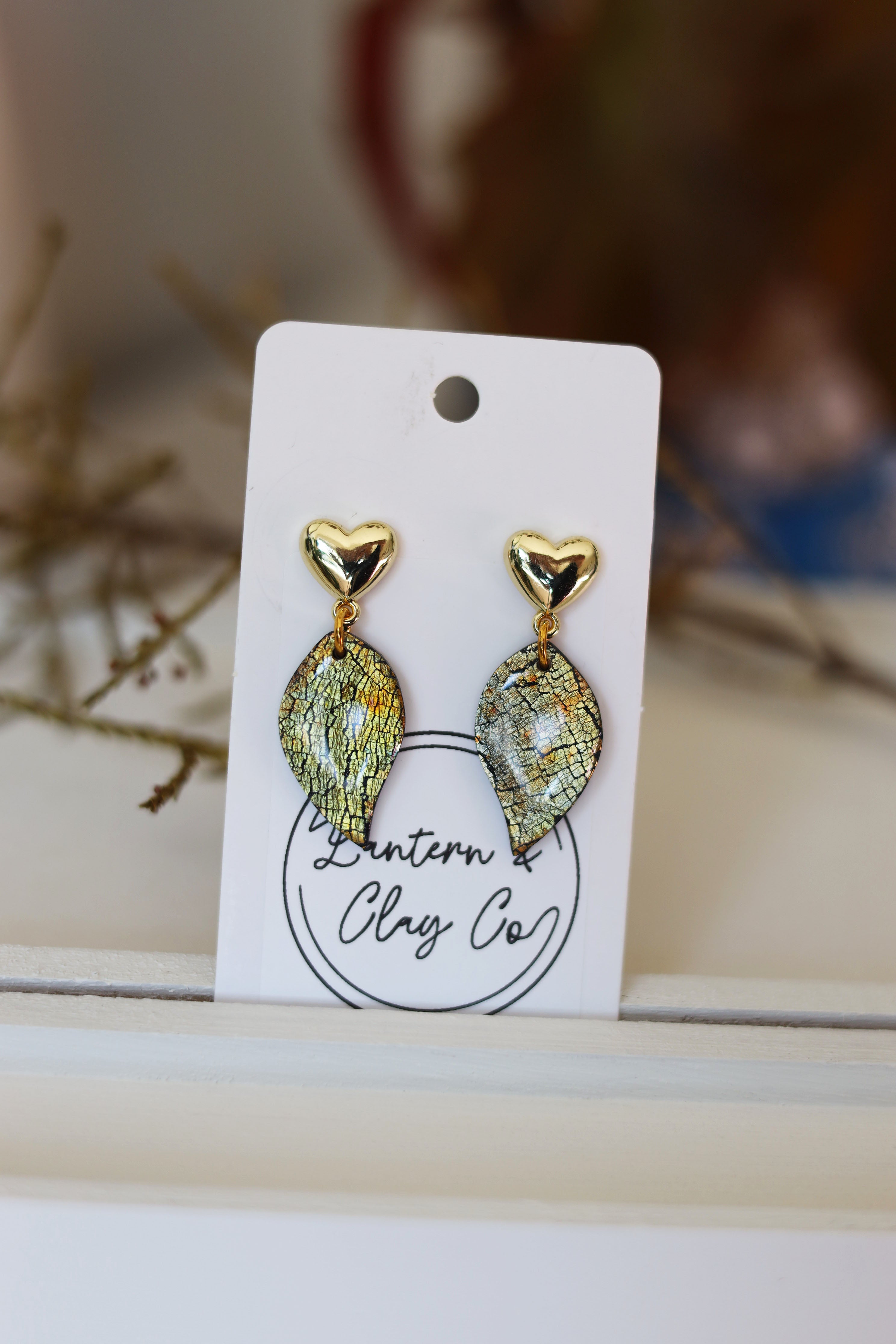 Gold plated heart stud with gold foil tear drop dangle earrings