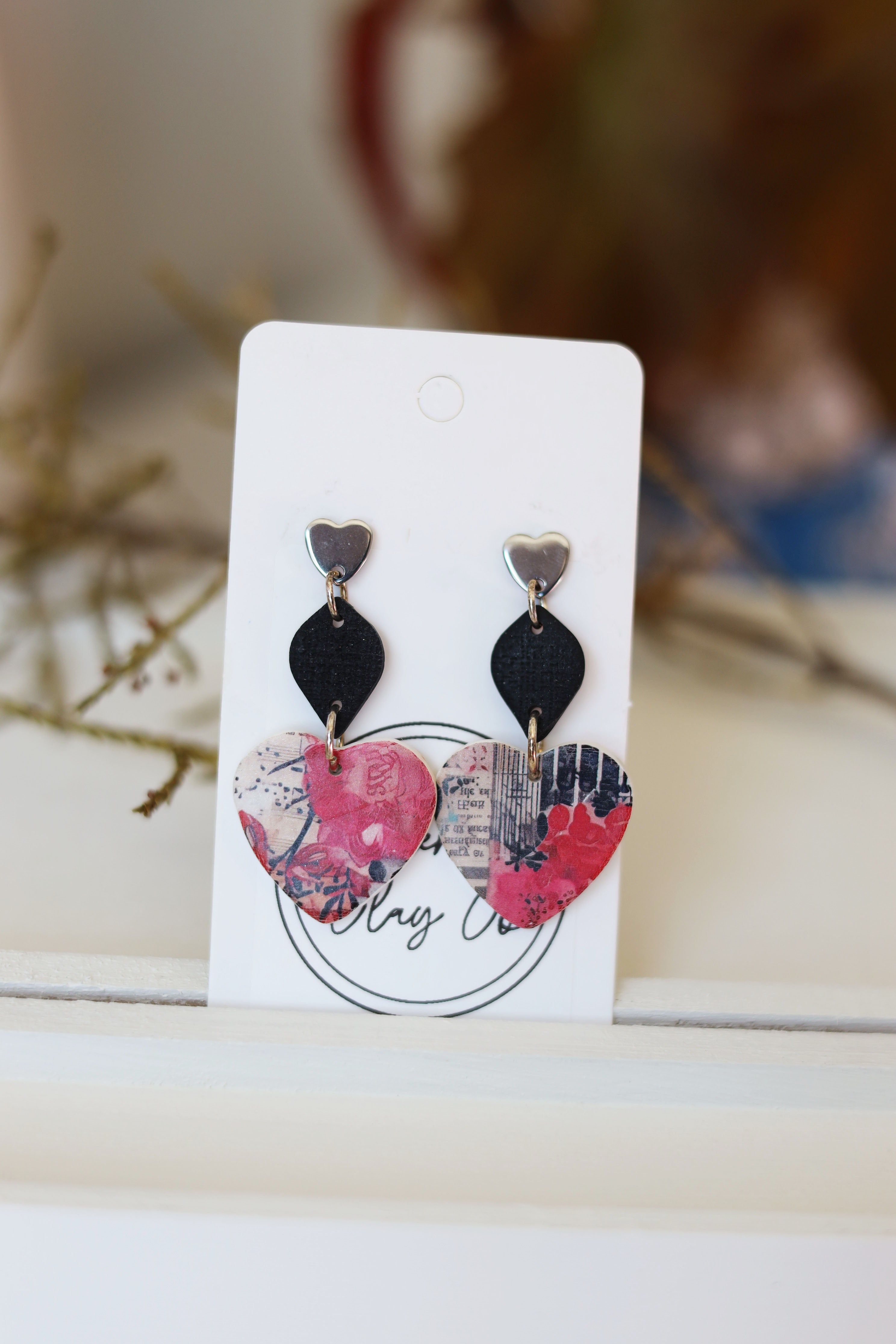 Silver plated, black & pink heart shaped dangle earrings