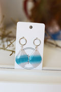 Sparkling translucent blue dangle earrings