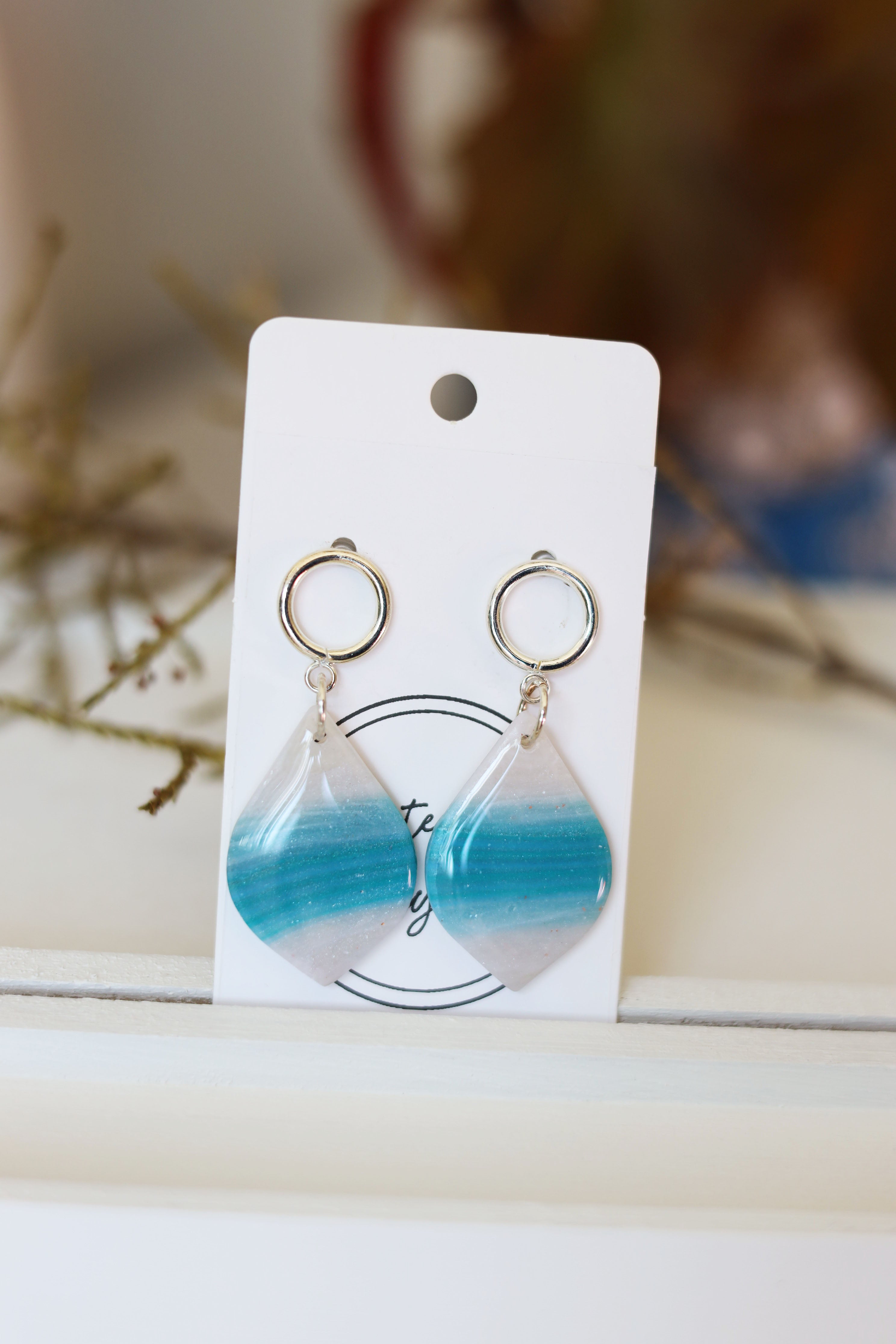 Sparkling translucent blue dangle earrings
