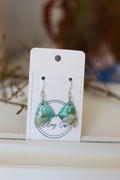 Green & white dangle earrings