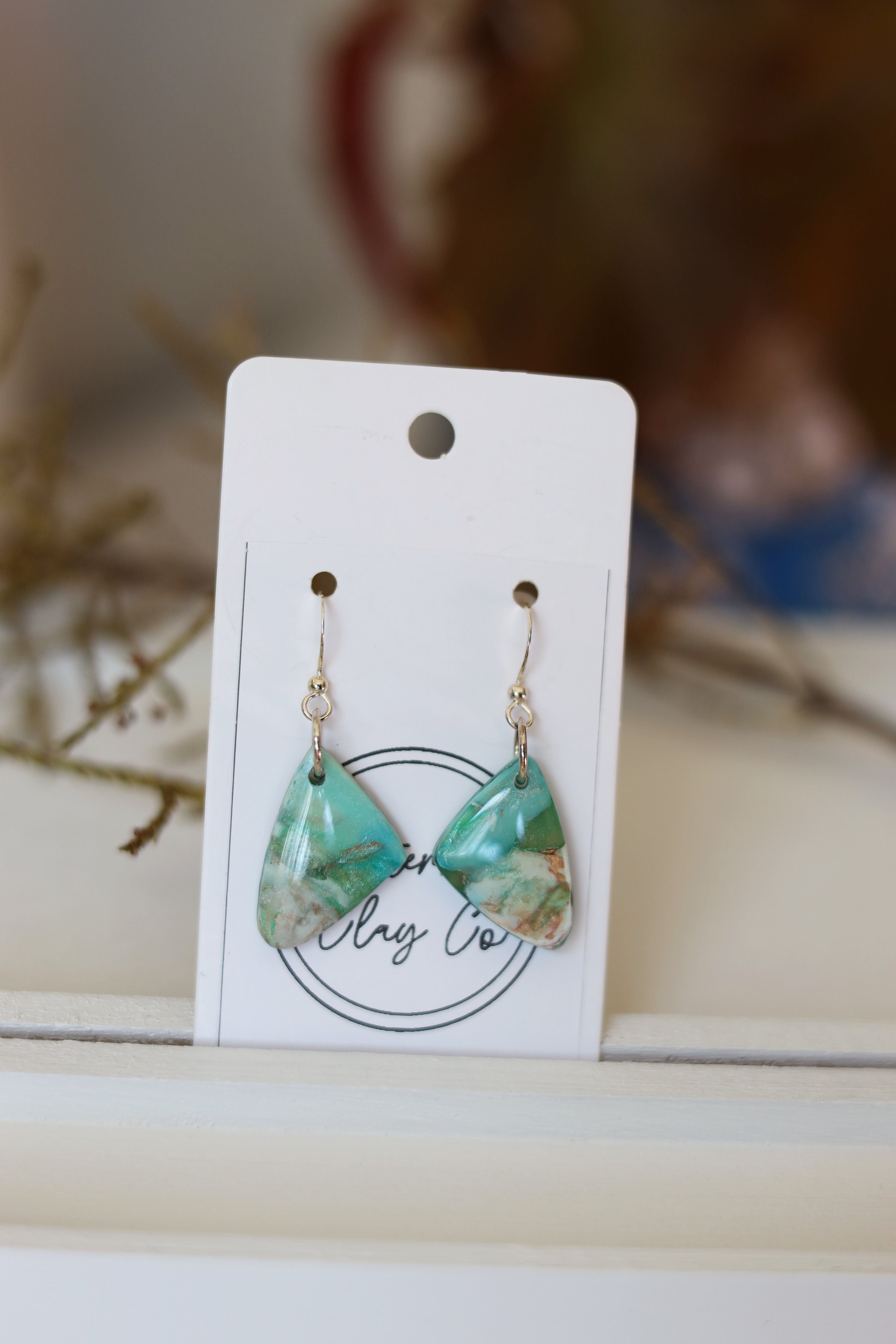 Green & white dangle earrings