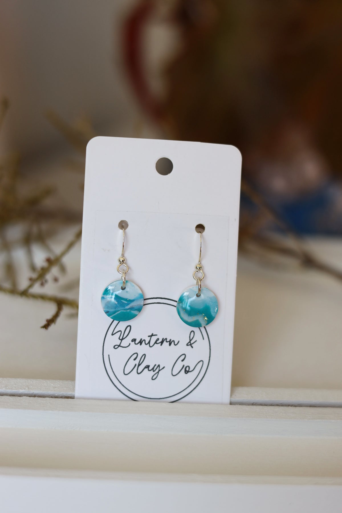 White & blue dangle earrings