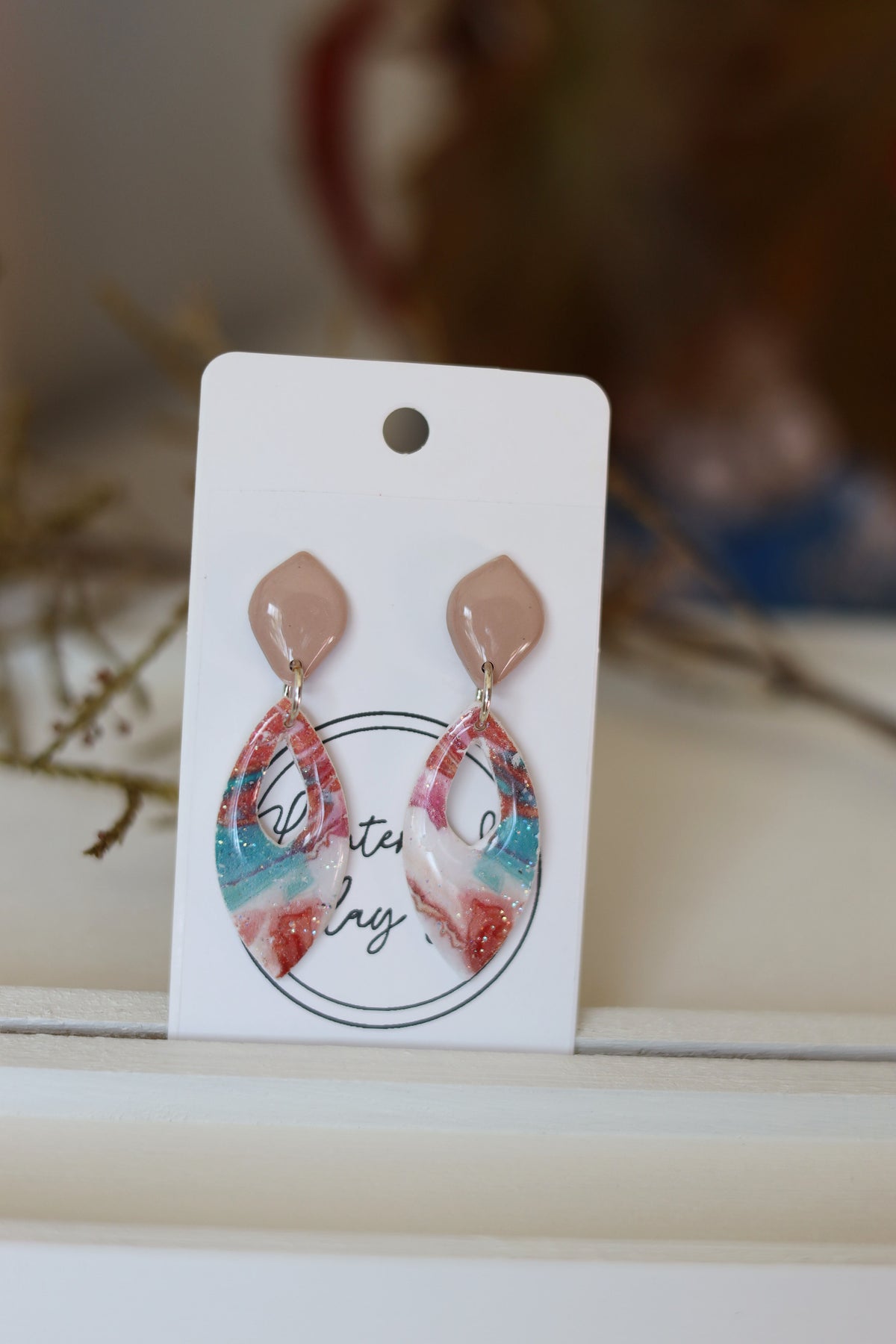 Blue, pink & white dangle earrings with beige studs