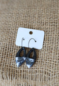 Black and white dangle earrings