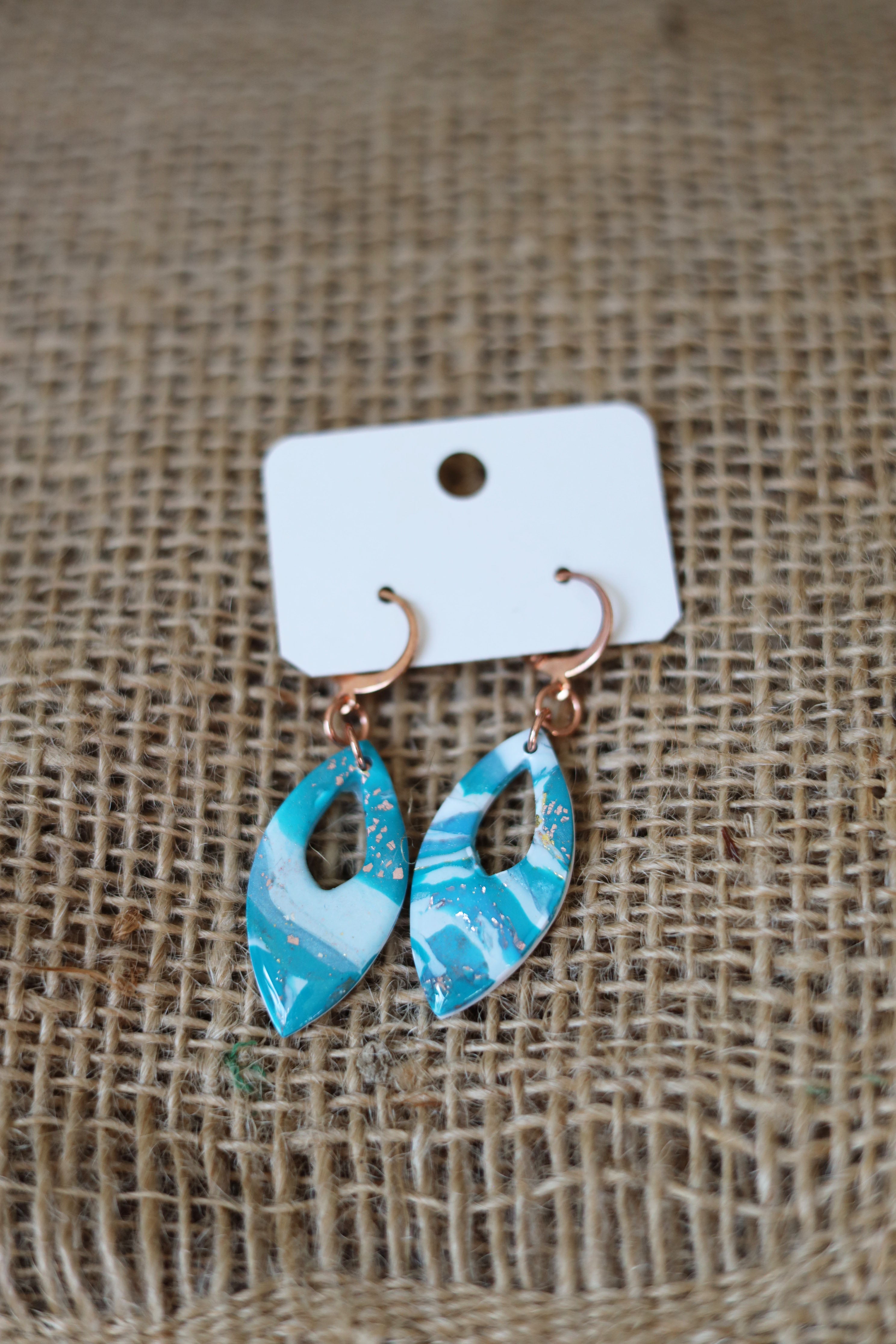 White & blue specks of rose gold foil dangle earrings