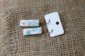 White, blue and beige dangle earrings