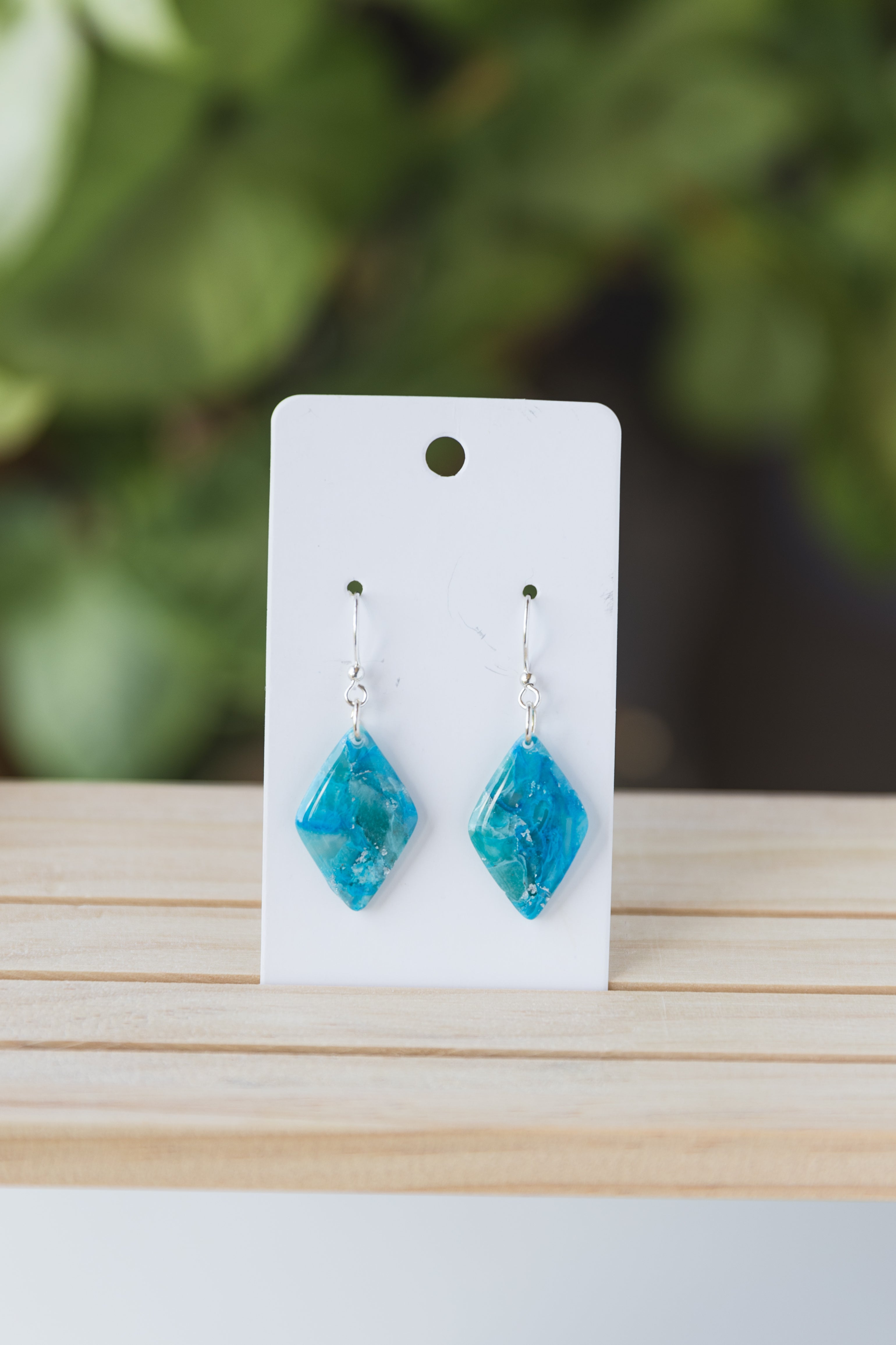 Blue and green faux stone dangle earrings