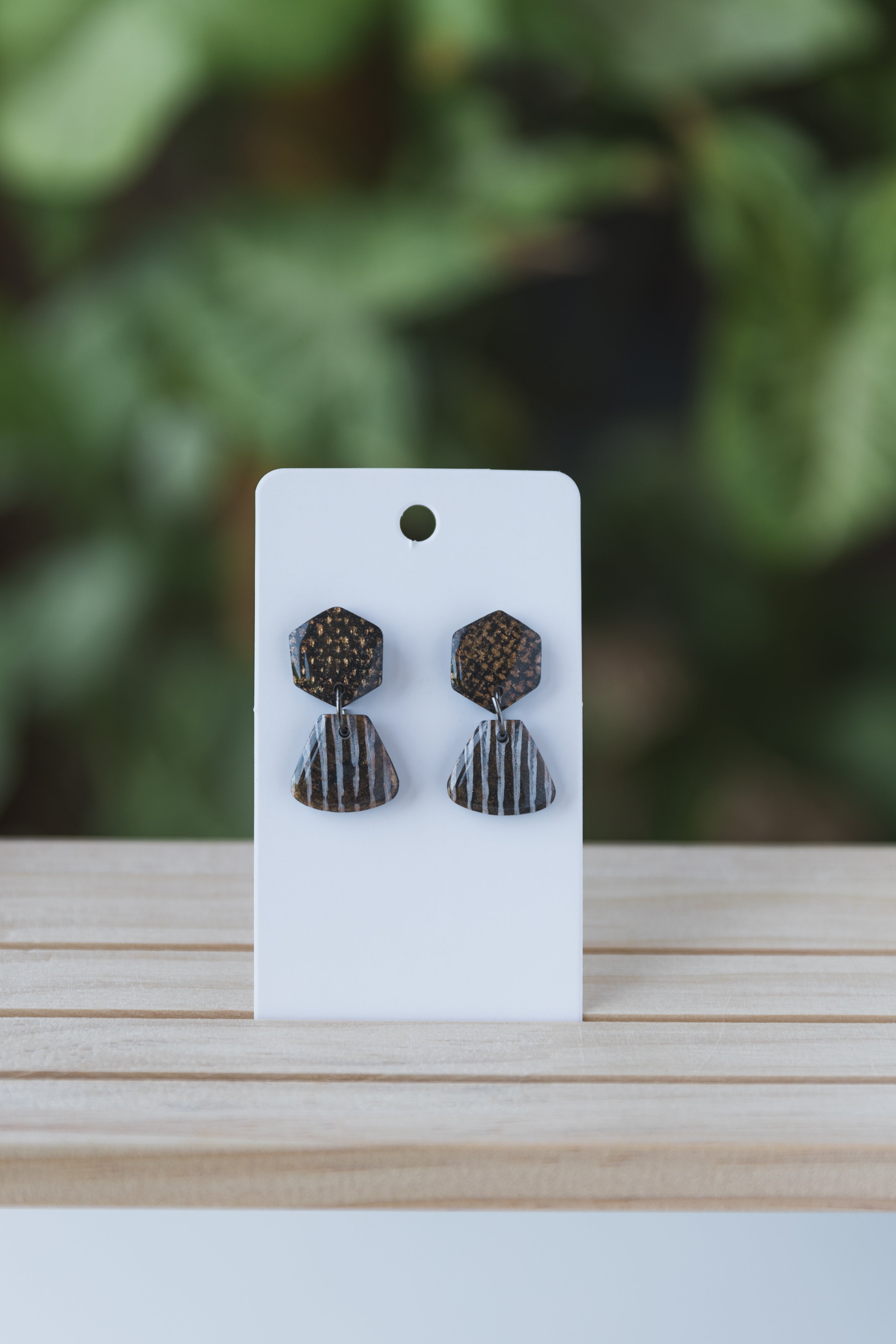 Punk black speckled and white striped dangle earrings