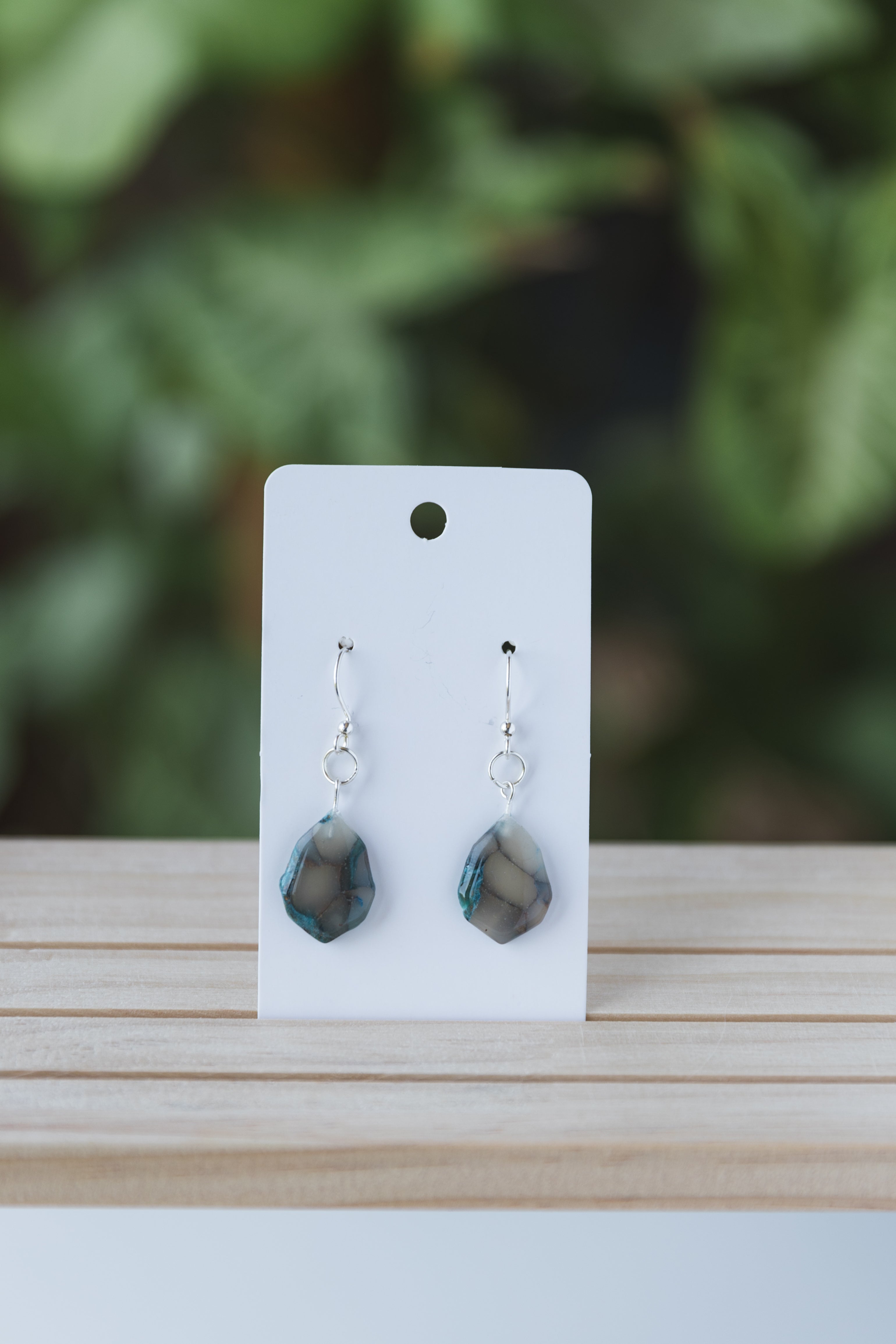 Blue and translucent dangle earrings