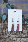 Magenta with specks of green faux stone dangle earrings